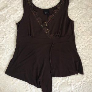 Wrap style top with lace and sequins